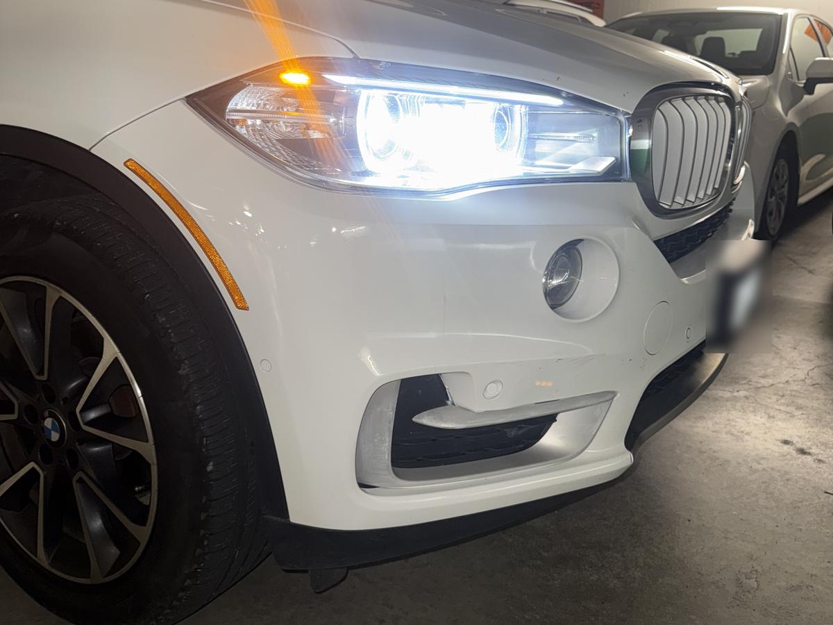 The same BMW with the front bumper repaired